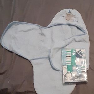 Newborn towel swaddle with washcloths
